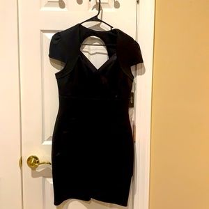 Brand new Guess (with tags) black cocktail dress - size 12 Elegant and unique!